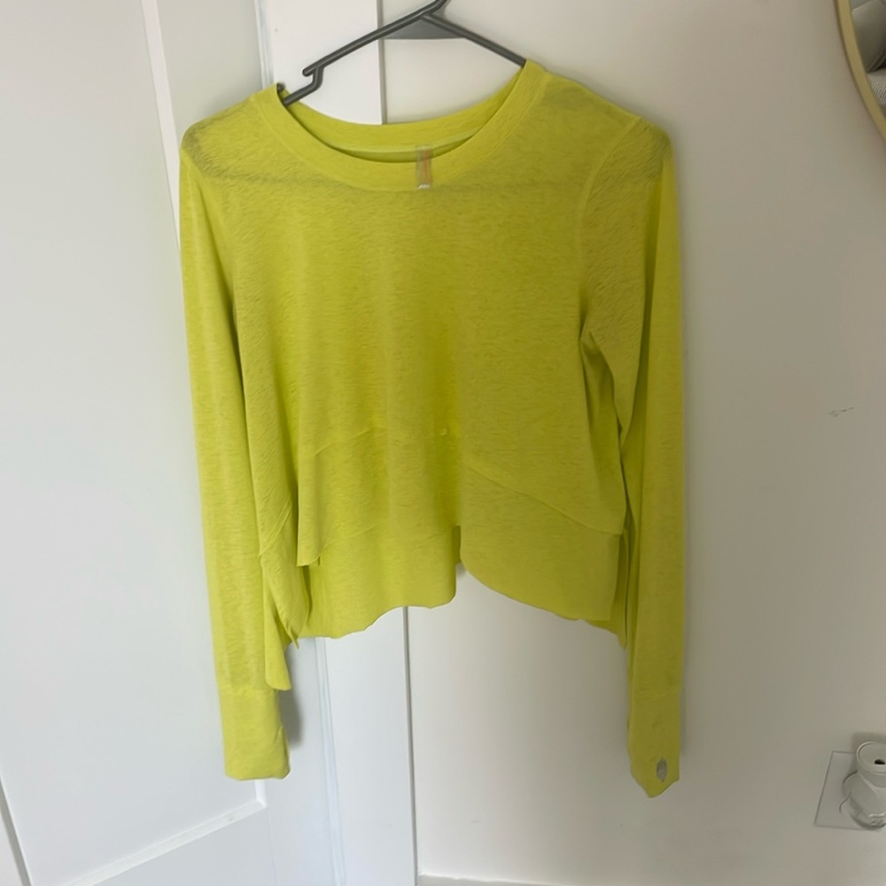 Three people running top lime green